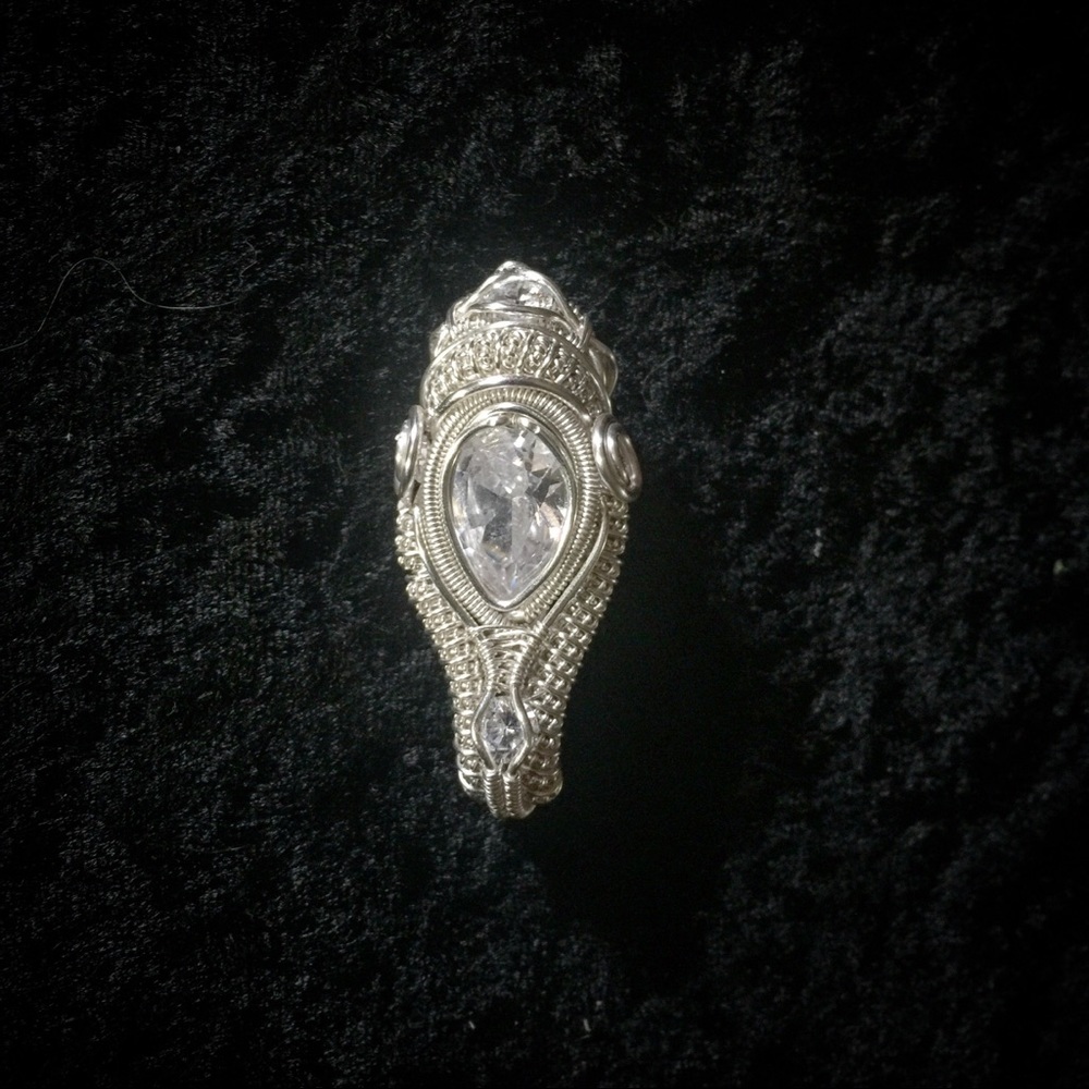 White sapphire pendant.